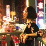 霓虹中伤感侧脸女人头像图片